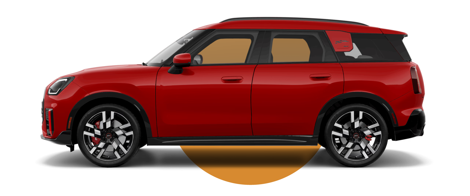 Side view of a MINI JCW Countryman ALL4 in the Chili Red II body color, facing left with its shadow underneath it.