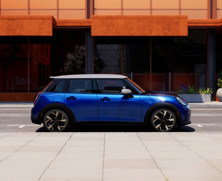 Side profile shot of metallic blue MINI Cooper 4 door