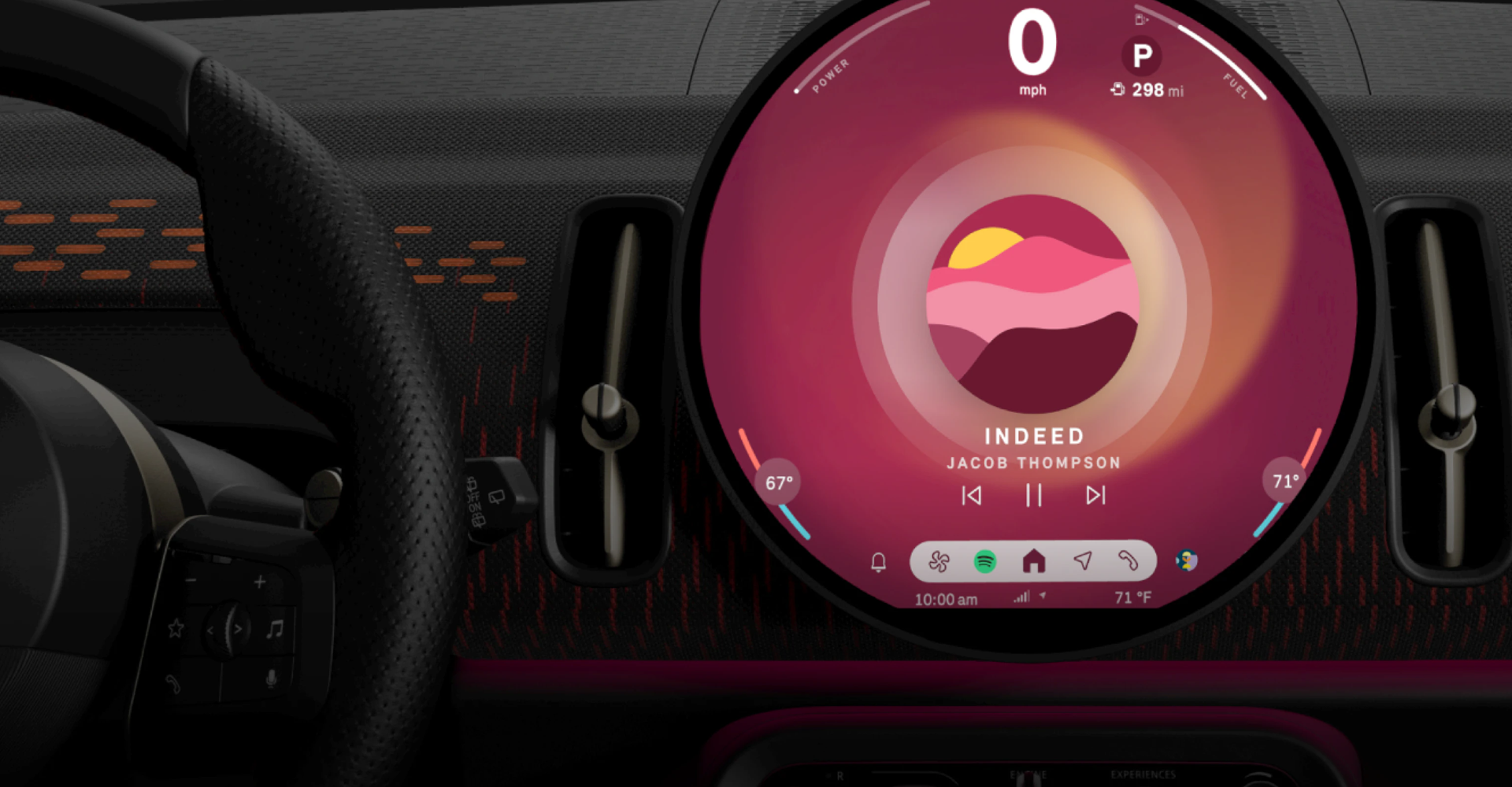 Closeup view of the 9.4” round center information OLED display in a MINI Countryman S ALL4.