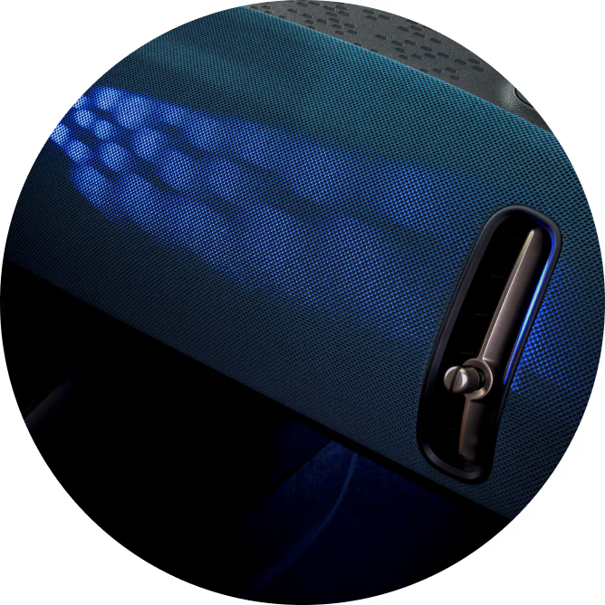 A close-up of blue projections cast across the dashboard.