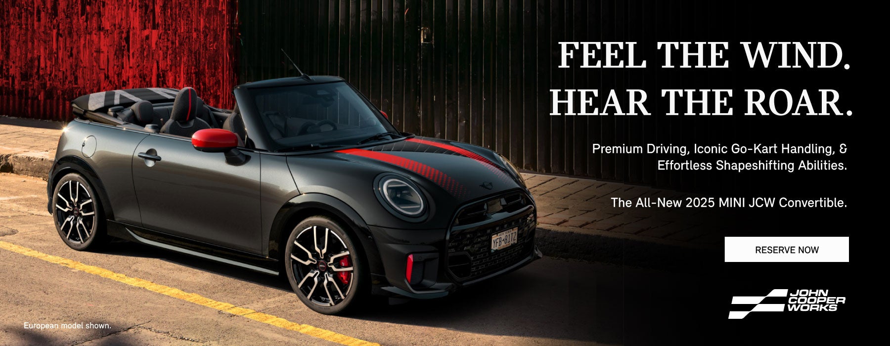 ¾ ariel view of a black MINI Cooper 2 Door.