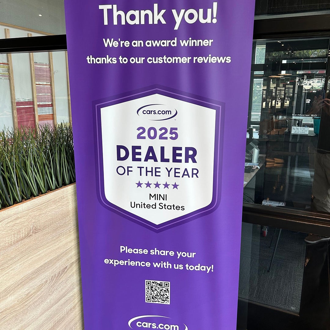 MINI of Allentown United States Dealer of the Year sign in the showroom.
