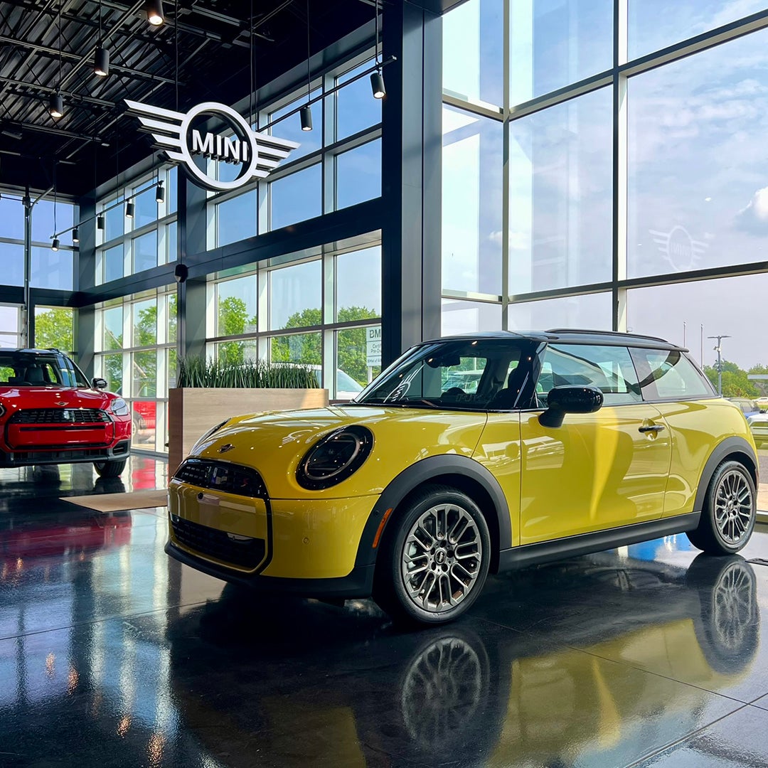 Yellow 2025 MINI Cooper in the MINI of Allentown showroom.